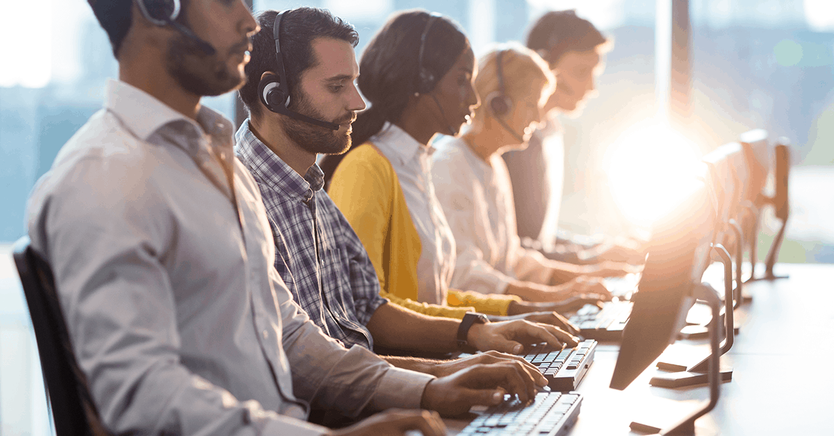 call center people answer phones at help desks